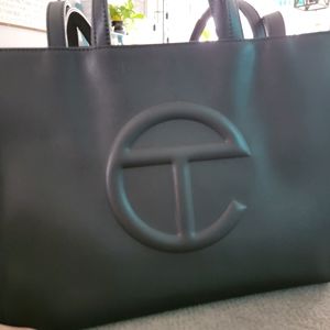 Medium Telfar Shopping Bag, only used once. Comes with it's drawstring bag